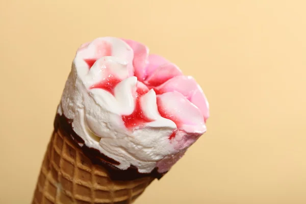 Berry icecream waffle cone on orange — Stock Photo, Image