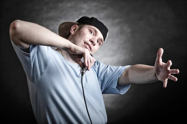 Rap singer man with microphone cool hand gesture — Stock Photo, Image