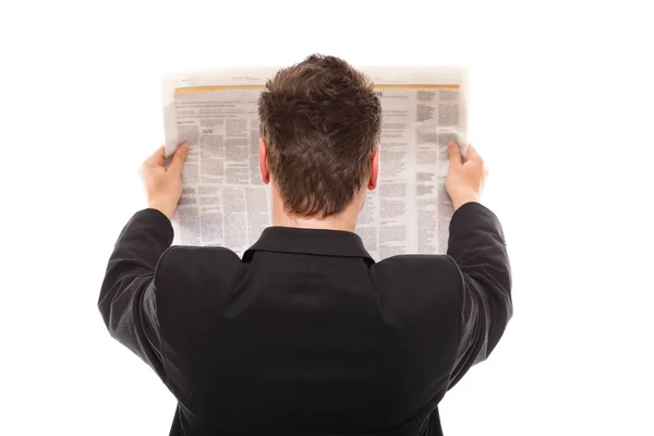 Geschäftsmann liest isoliert eine Zeitung — Stockfoto