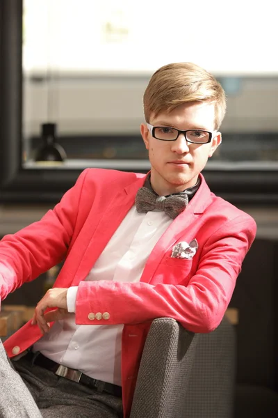 Young handsome stylish man posing indoor — Stock Photo, Image