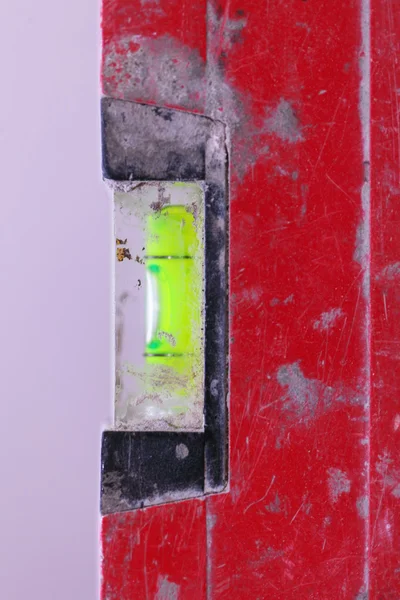 Byggnadsplatsens nivå av röd sprit — Stockfoto