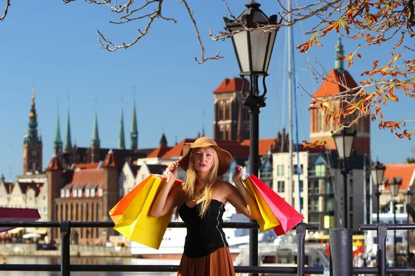 Stylish shopper woman in old town Gdansk — Stock Photo, Image