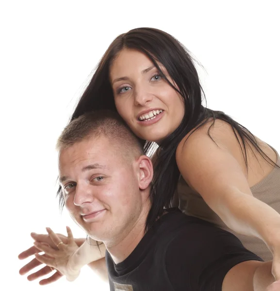 Cheerful couple having fun young smiling people embracing — Stock Photo, Image