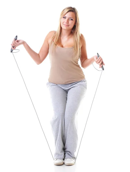 Young fitness woman with jump rope isolated — Stock Photo, Image