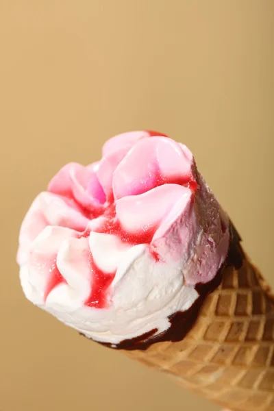 Berry icecream waffle cone on orange — Stock Photo, Image