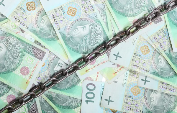 Polieren von Geld als Hintergrundkette für Sicherheitsinvestitionen — Stockfoto