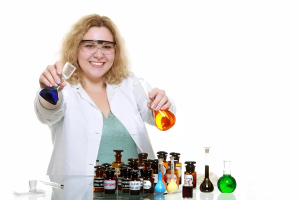 Chemist woman with chemical glassware flask isolated — Stock Photo, Image