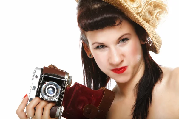 Pretty retro girl in hat with vintage camera — Stock Photo, Image