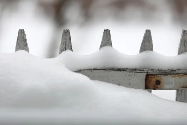 Fresh snow on a fence winter season — Stock Photo, Image