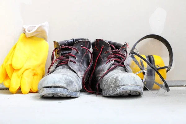 Construction equipment work boots noise muffs — Stock Photo, Image