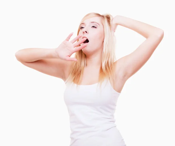 Sleepy tired young woman yawning isolated on white — Stock Photo, Image