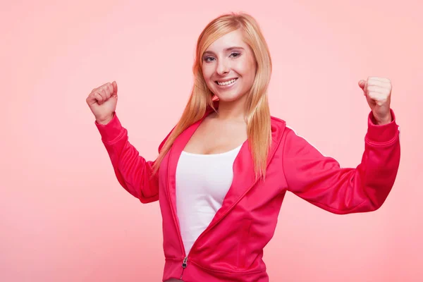 Fitness woman showing energy flexing biceps — Stock Photo, Image