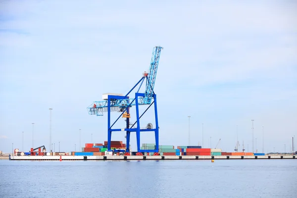 Port cargo crane and container over blue sky — Stock Photo, Image