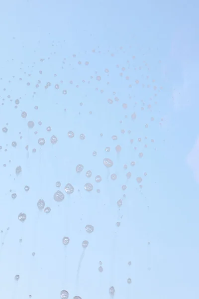 Gotas en la ventana de limpieza del cristal de la ventana —  Fotos de Stock