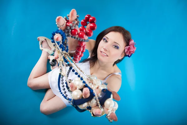 Summer girl plenty of jewellery beads in hands — Stock Photo, Image