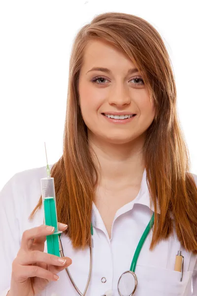 Doctor or nurse holds a syringe, healthcare concept Royalty Free Stock Photos