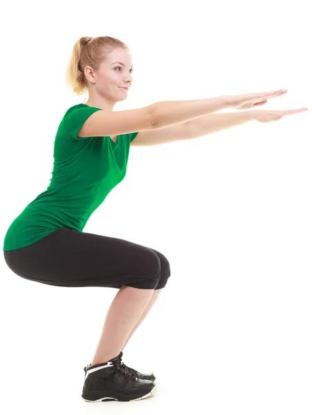 Ung sportig flicka göra stretching motion isolerade — Stockfoto