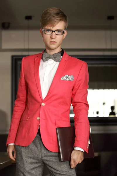 Young handsome stylish man posing indoor — Stock Photo, Image