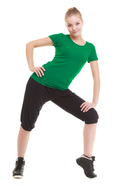 Ung sportig flicka göra stretching motion isolerade — Stockfoto