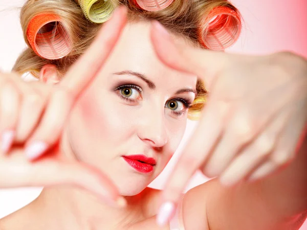 Sexy woman in underwear curlers making frame — Stock Photo, Image