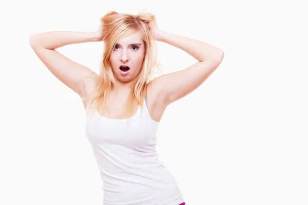 Stress. Young woman frustrated pulling her hair on white — Stock Photo, Image