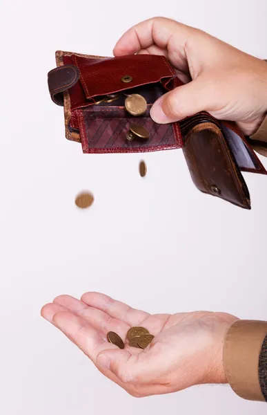 Empresário quebrado com bolsa vazia e moedas de polimento — Fotografia de Stock