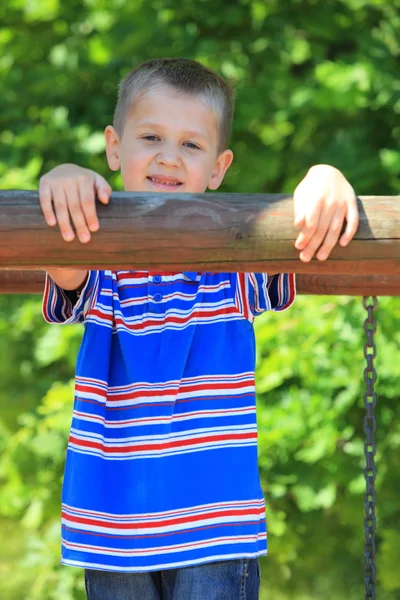 Child boy or kid playing on playground — Stock Photo, Image