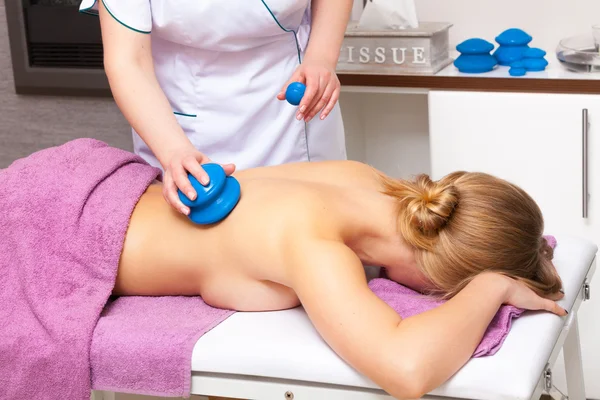 Beauty salon. Woman getting spa cupping glass vacuum massage — Stock Photo, Image