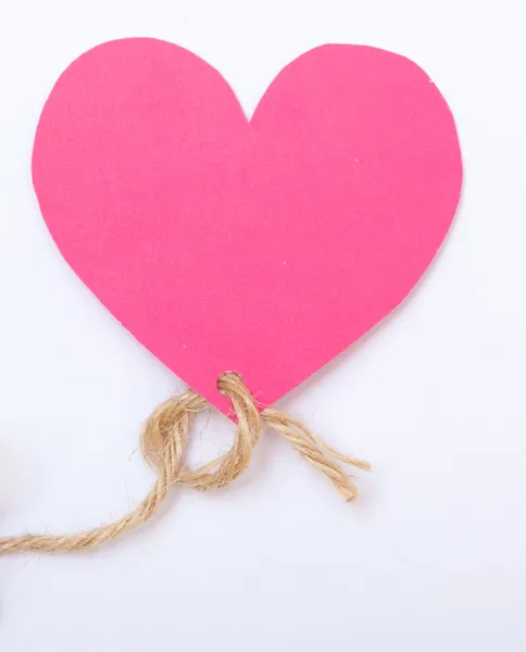 Pink paper heart with string symbol love valentine's day — Stock Photo, Image