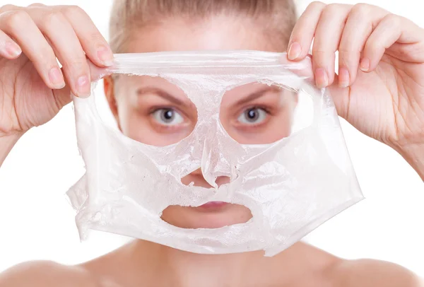 Portrait blond girl in facial mask. Beauty and skin care. — Stock Photo, Image