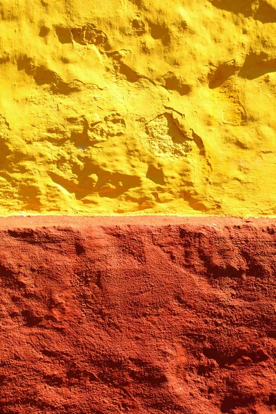 Giallo sfondo della parete vernice rossa o texture — Foto Stock