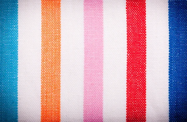 Nahaufnahme von bunt gestreiften Textilien als Hintergrund oder Textur — Stockfoto