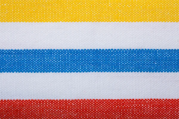 Detailní záběr barevných pruhovaných textilií jako pozadí nebo textura — Stock fotografie