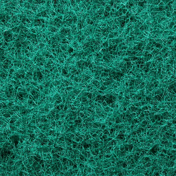 Green abrasive sponge texture background — Stock Photo, Image