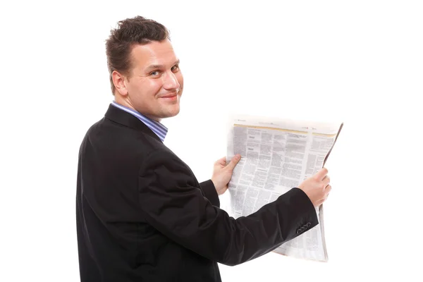 Businessman reading a newspaper — Stock Photo, Image