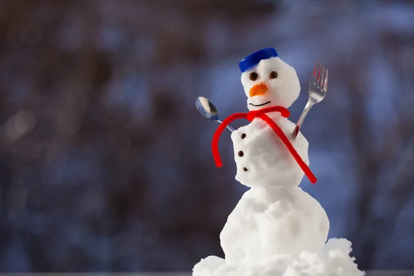 Little happy christmas snowman with fork outdoor. Winter season. — Stock Photo, Image