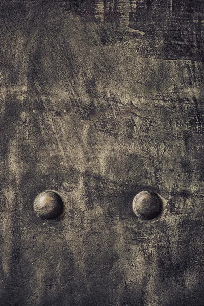 Grunge plaque métallique noire avec rivets vis texture de fond — Photo
