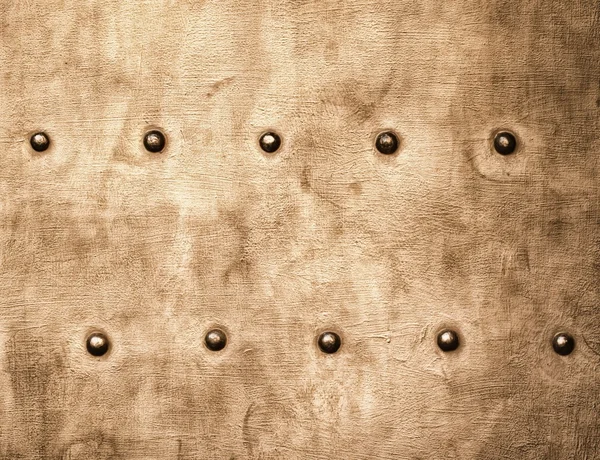 Grunge zlaté hnědé plech nýty texturu pozadí šrouby — Stock fotografie