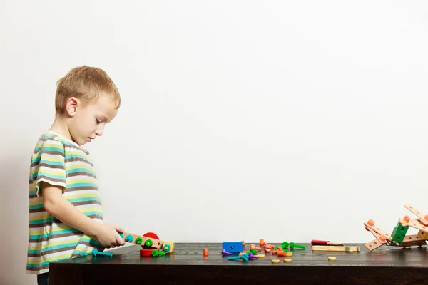 Boy playing with building blocks toys — Stock Photo, Image