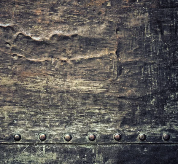 리벳 배경 텍스처 나사가 있는 검은 금속판을 그루터기 — 스톡 사진