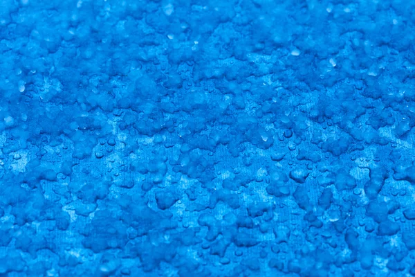 Macro sciogliere la texture di sfondo blu neve. Inverno . — Foto Stock