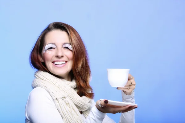 Winter makeup woman with cup of hot beverge — Stock Photo, Image