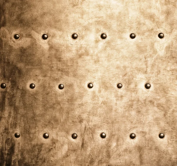 Grunge guld brun metallplattan nitar skruvar bakgrundsstruktur — Stockfoto