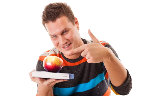 Człowiek posiadający książki i czerwone jabłko. zdrowy umysł i ciało — Zdjęcie stockowe