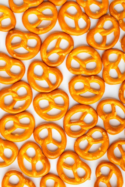 Pretzels pattern as food background on white — Stock Photo, Image