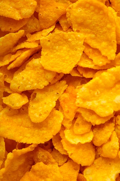 Closeup of corn flakes breakfast morning meal as food background — Stock Photo, Image