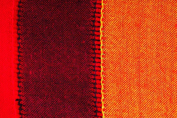 Zbliżenie czerwone tkaniny materiału włókienniczego oraz tekstura tło — Zdjęcie stockowe