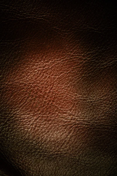 Brown couro texturizado grunge fundo closeup — Fotografia de Stock