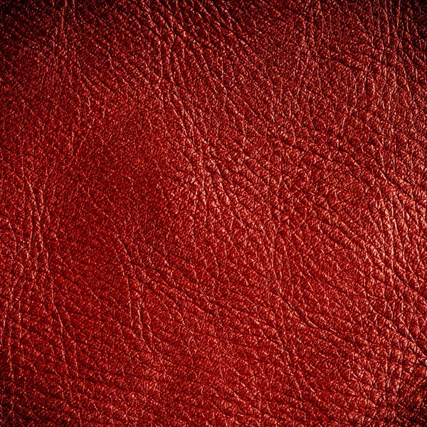 Röd texturerade läder grunge bakgrund närbild — Stockfoto
