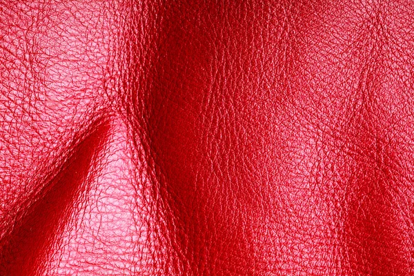 Textura de dobras fundo de couro vermelho vívido pele — Fotografia de Stock